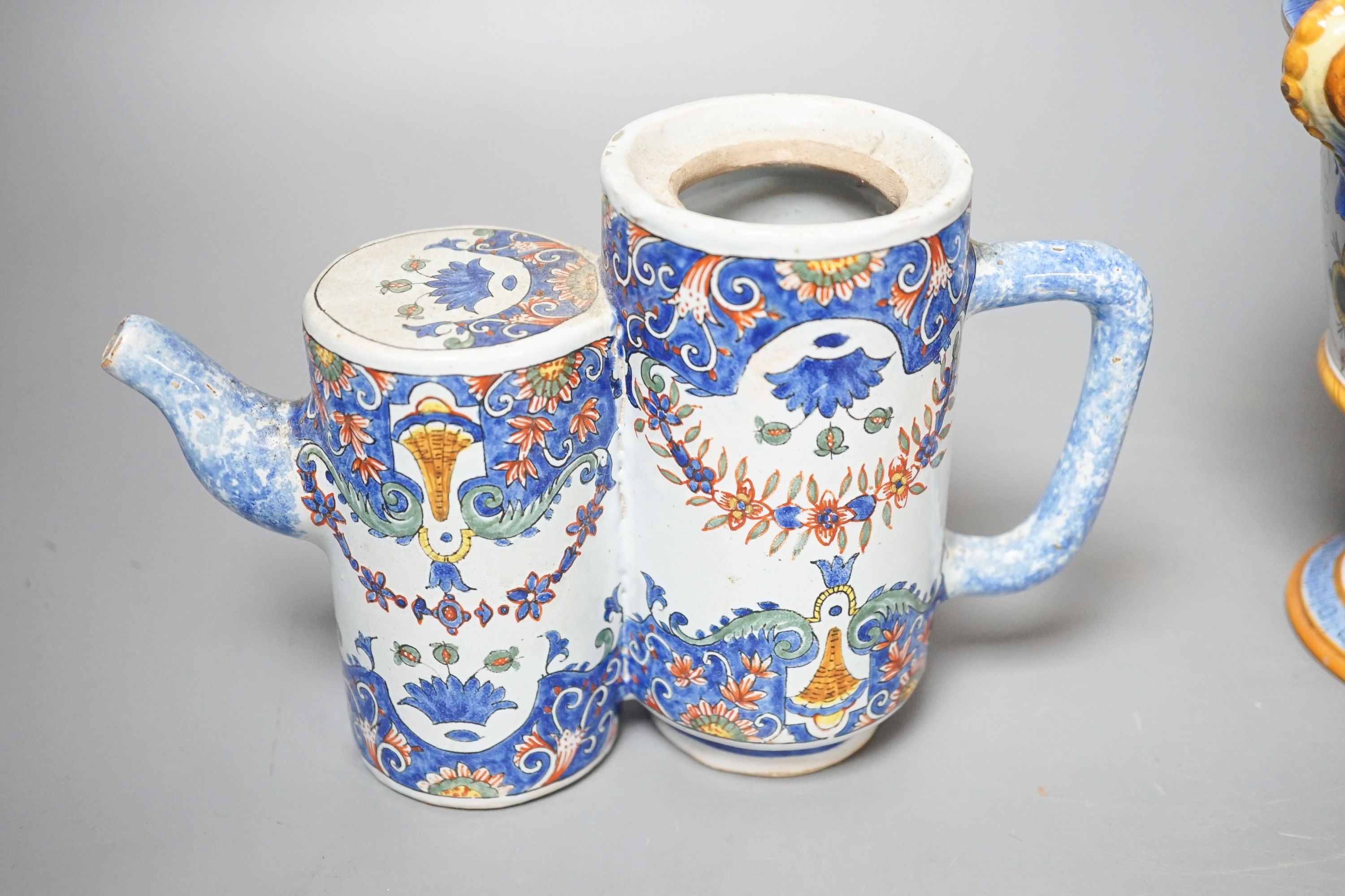 A Ginori maiolica two handled vase and Delft polychrome double cylinder teapot 27cm